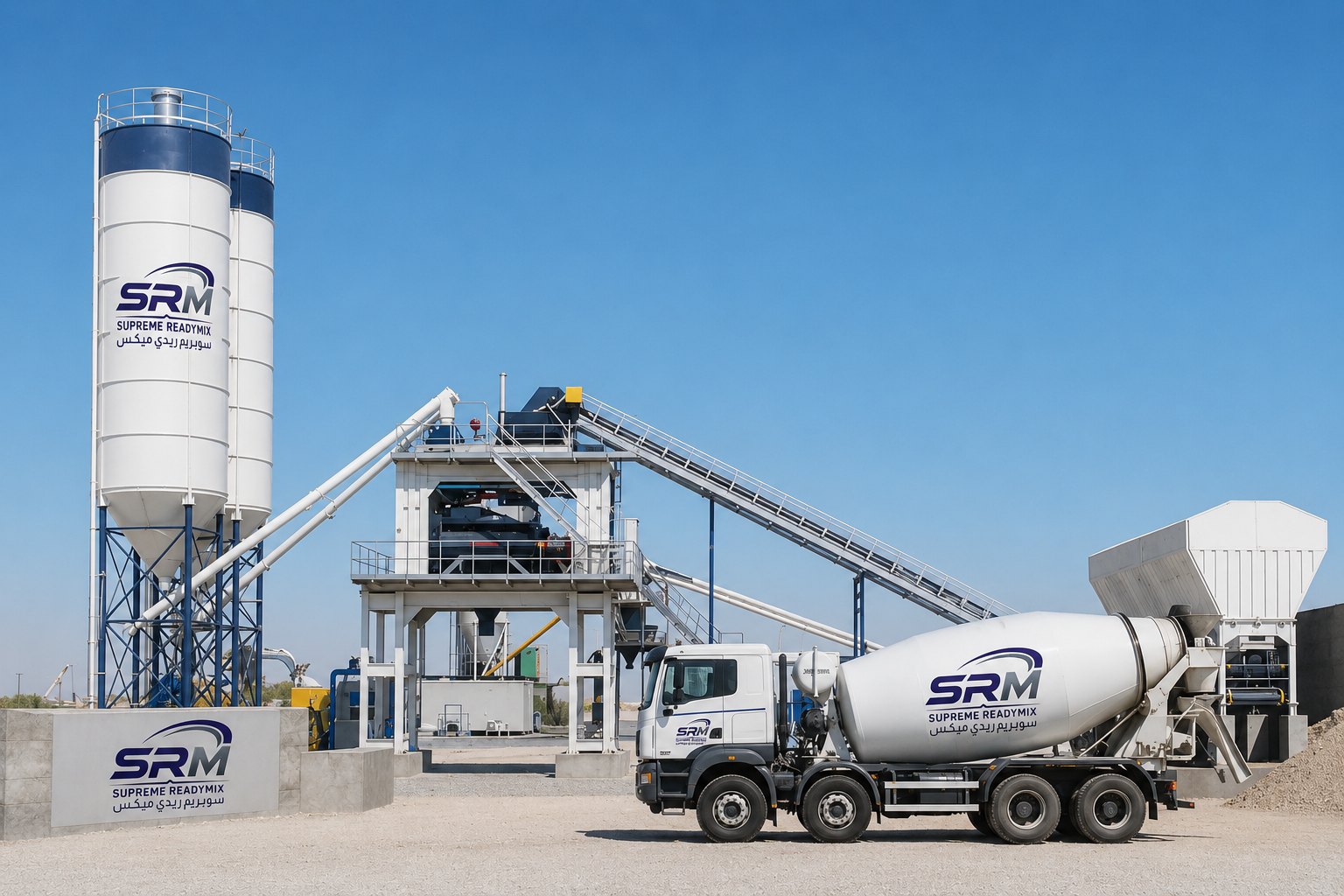 SRM batching plant with two cement silos and a transit mixer on a gravel yard